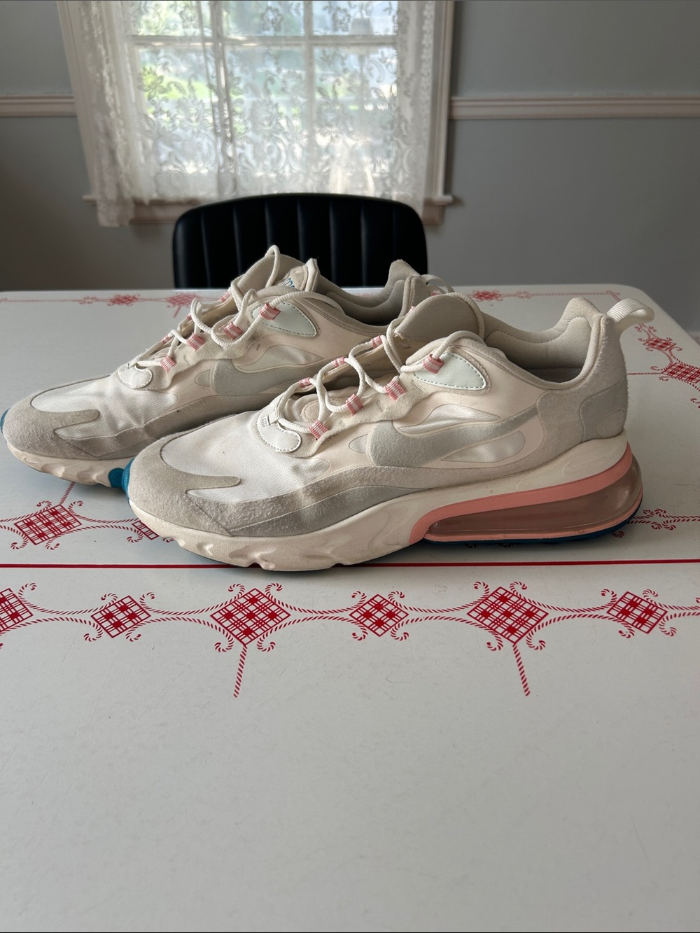 Nike Men’s 
Low-Top Athletic Sneakers in Cream and Pink Accents